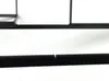 A close-up shot of a black metal frame with a small notch in the center. Náhľad obrázku produktu