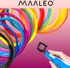 A hand holding a blue 3D printing pen, creating a square shape with black filament, surrounded by colorful spools of filament. Náhled obrázku produktu
