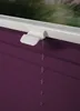 A close-up view of a purple pleated blind with a white handle, showing the texture and mechanism. Produktbild-Vorschau