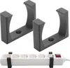 Two black brackets and a white power strip with a red switch. Produktbild-Vorschau