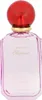 A perfume bottle with a red cap and pink glass. Voir les images du produit