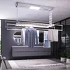 A modern bathroom with a ceiling-mounted electric clothes drying rack. Produktbild-Vorschau