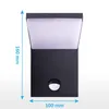 A black LED outdoor wall light with a motion sensor, shown against a white background with dimensions indicated. Produktbild-Vorschau
