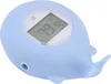 A close-up shot of a light blue, whale-shaped digital thermometer against a white background. Produktbild-Vorschau