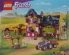LEGO Friends farm set packaging showing the assembled toy in a farm setting. Produktbild-Vorschau