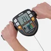 Hands holding a Tanita body composition scale. Produktbild-Vorschau