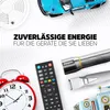 A collection of electronic devices and accessories, including a remote control, flashlight, alarm clock, and a toy robot, arranged around a central text message. Anteprima dell’immagine prodotto