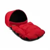 A red dog bed with a black interior, shown from a slightly elevated side angle on a white background. Anteprima dell’immagine prodotto
