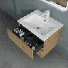 A bathroom vanity with an open drawer displaying toiletries and accessories. Produktbild-Vorschau