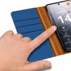 A hand is shown interacting with a smartphone inside a blue and brown flip case. Produktbild-Vorschau