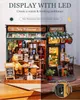 A miniature model of a restaurant and bar with LED lighting. Produktbild-Vorschau