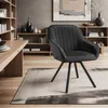A modern dining room setting with a black upholstered chair and a wooden table. Voir les images du produit