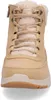 A close-up front view of a beige Skechers boot. Voir les images du produit