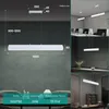 A collage of images showing a modern white LED pendant light in various settings, including dimensions and specifications. Produktbild-Vorschau