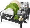 A black dish drying rack filled with plates, bowls, cups, and cutlery. Náhled obrázku produktu