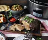 A slow cooker meal with roasted meat, grain salad, and flatbread. Náhled obrázku produktu