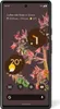 A Google Pixel 6 smartphone displaying its home screen with a floral wallpaper and various widgets. Produktbild-Vorschau