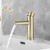 A close-up shot of a brushed gold faucet with water flowing into a white sink. Produktbild-Vorschau