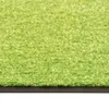 A close-up, angled view of a green carpet or rug. Voir les images du produit