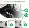 A close-up view of a kitchen faucet with a pull-out spray head, demonstrating its features and functionality. Produktbild-Vorschau