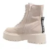 A side view of a beige lace-up boot with a thick platform sole. Produktbild-Vorschau