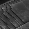 A close-up view of the interior card slots of a black leather wallet. Produktbild-Vorschau