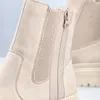 Close-up view of a beige boot. Produktbild-Vorschau