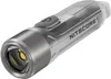 A close-up studio shot of a Nitecore TIKI flashlight against a white background. Podgląd zdjęcia produktu