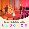 Two children are dancing in a room with colorful lights, with a karaoke machine on a table. Produktbild-Vorschau