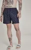 Urban Classics - PATTERN Plavecké šortky flamingo - M Náhľad obrázku produktu 7