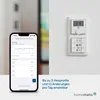 A smartphone displaying a heating schedule app is shown next to a wall-mounted thermostat. Produktbild-Vorschau