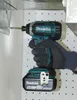 A gloved hand is holding a cordless impact driver, using it to screw into a metal surface. Produktbild-Vorschau