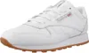 A white Reebok Classic Leather sneaker with a gum sole is shown from a side-angle. Produktbild-Vorschau