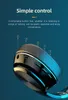Close-up of a black wireless earbud with gold accents and blue LED lighting, against a dark blue background. Text overlays describe features. Produktbild-Vorschau