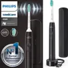 A Philips Sonicare electric toothbrush and its accessories are displayed against a dark background. Produktbild-Vorschau