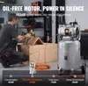 A man is using a nail gun connected to an air compressor in a workshop setting. The image also includes a graphic comparing noise levels. Produktbild-Vorschau