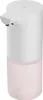 A white and pink automatic foaming soap dispenser. Produktbild-Vorschau