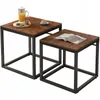 Two nesting coffee tables with a rustic wood-like top and black metal frames, displayed on a white background. Podgląd zdjęcia produktu