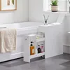 A slim white cabinet with drawers next to a bathtub in a bathroom. Produktbild-Vorschau