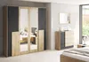 A bedroom scene featuring a wardrobe and a chest of drawers. Voir les images du produit