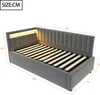 A gray upholstered bed frame with a slatted mattress base and integrated LED lighting. Anteprima dell’immagine prodotto