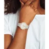 A woman's arm wearing a watch. Náhľad obrázku produktu