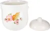 A white ceramic jar with a fruit design and its lid are shown on a white background. Podgląd zdjęcia produktu
