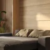A bed with pillows in a room with wooden walls. Náhled obrázku produktu