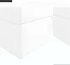 A close-up view of a white box spring bed base. Produktbild-Vorschau