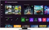 A screenshot of the Samsung Gaming Hub interface on a TV screen, displaying various game apps and recently played games. Produktbild-Vorschau
