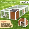 A rabbit run with a house in a grassy outdoor setting. Produktbild-Vorschau