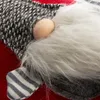 A close-up of a gnome's face and hat, part of a Christmas decoration. Produktbild-Vorschau