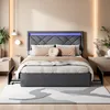 A modern bedroom with a upholstered bed and LED lighting.