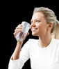 A woman drinks water from a glass. Náhľad obrázku produktu